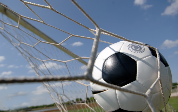 football - soccer ball in goal